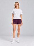 Model wearing Lane & Row Leisure Short Fleece in Black Cherry