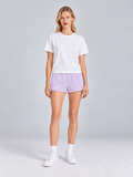 Model wearing Lane & Row Leisure Short Fleece in Lilac